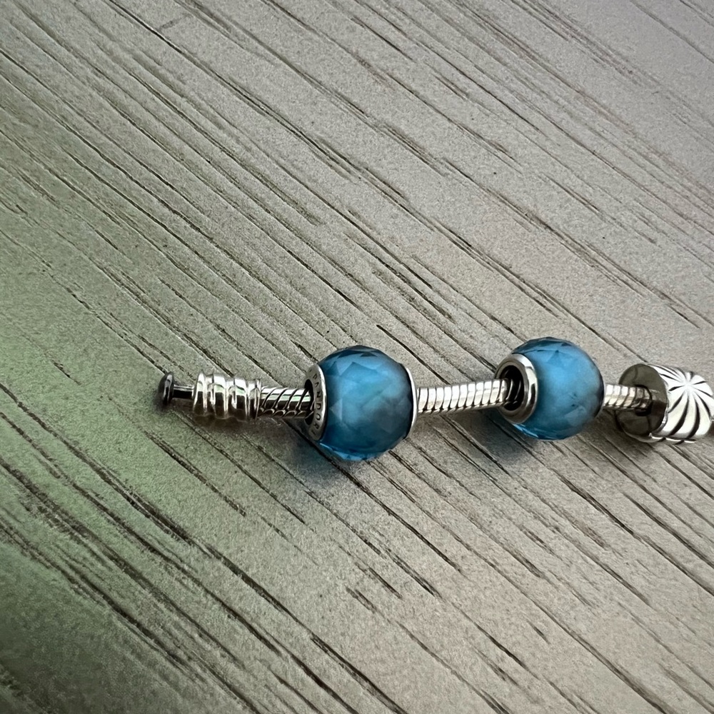 Two Pandora crystal charms (blue charms only- bracelet not included)